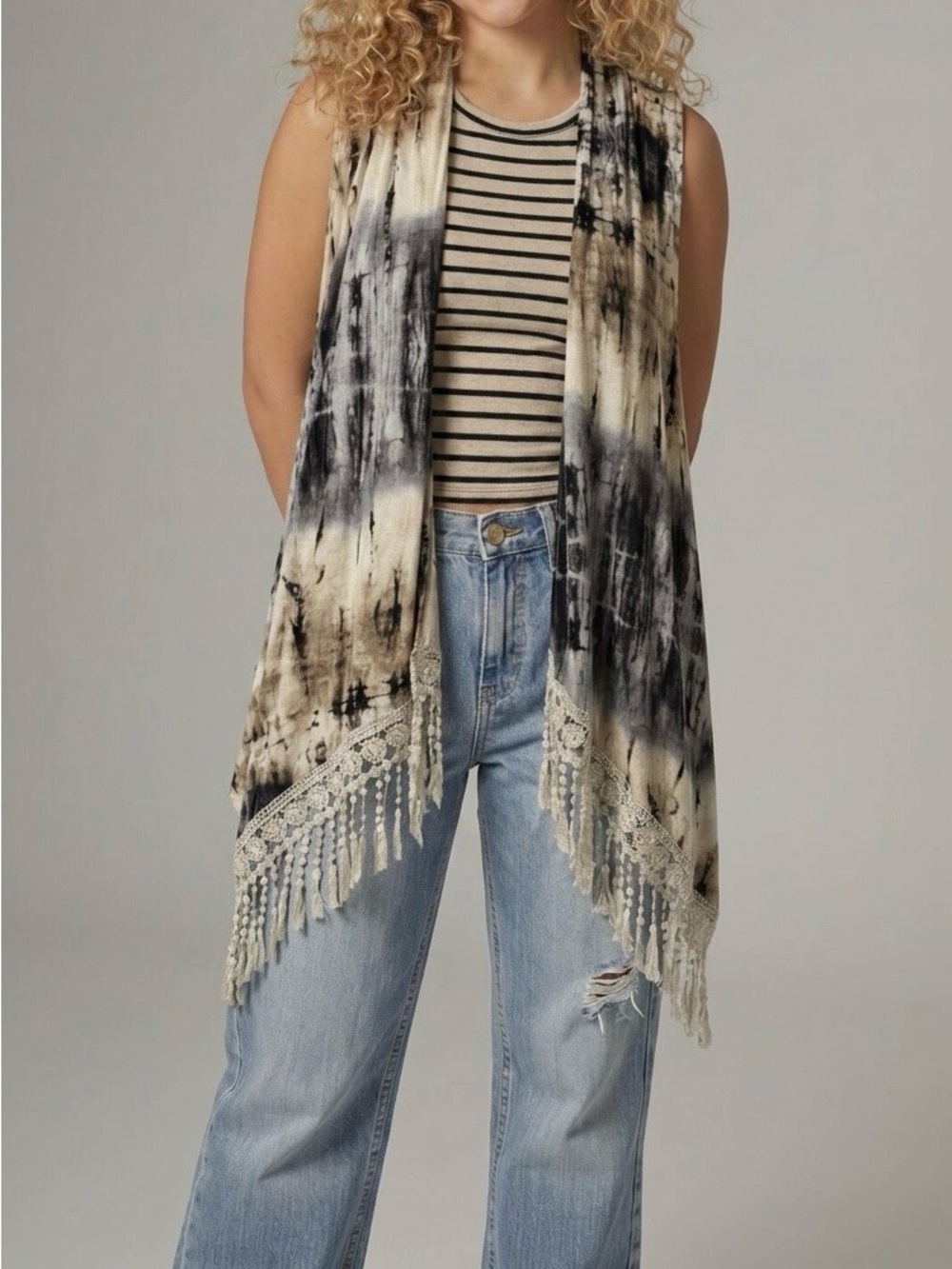 Striped and fringed vest.